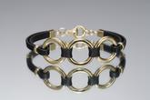 RFM "Di Classe" Goldtone Circle Station Bracelet, Adjustable