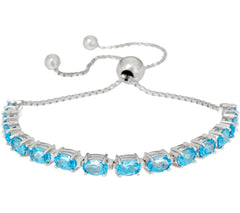 Pulsera ajustable de topacio azul con gema ovalada de plata de ley de 6,40 cts.
