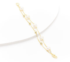 Pulsera Honora de plata de ley con perlas cultivadas y cuentas pulidas, revestida en oro, 18 cm