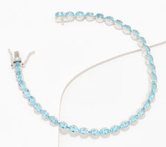 Pulsera de tenis Affinity Gems de plata de ley con topacio azul de corte ovalado de 18 cm