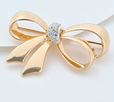 Joan Rivers Goldtone Polished Bow Pin with Pave Stones