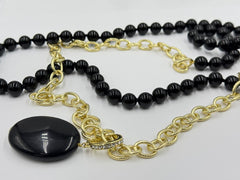 Heidi  "Loop Back Around" Black Transformable Charms Necklace. 52"