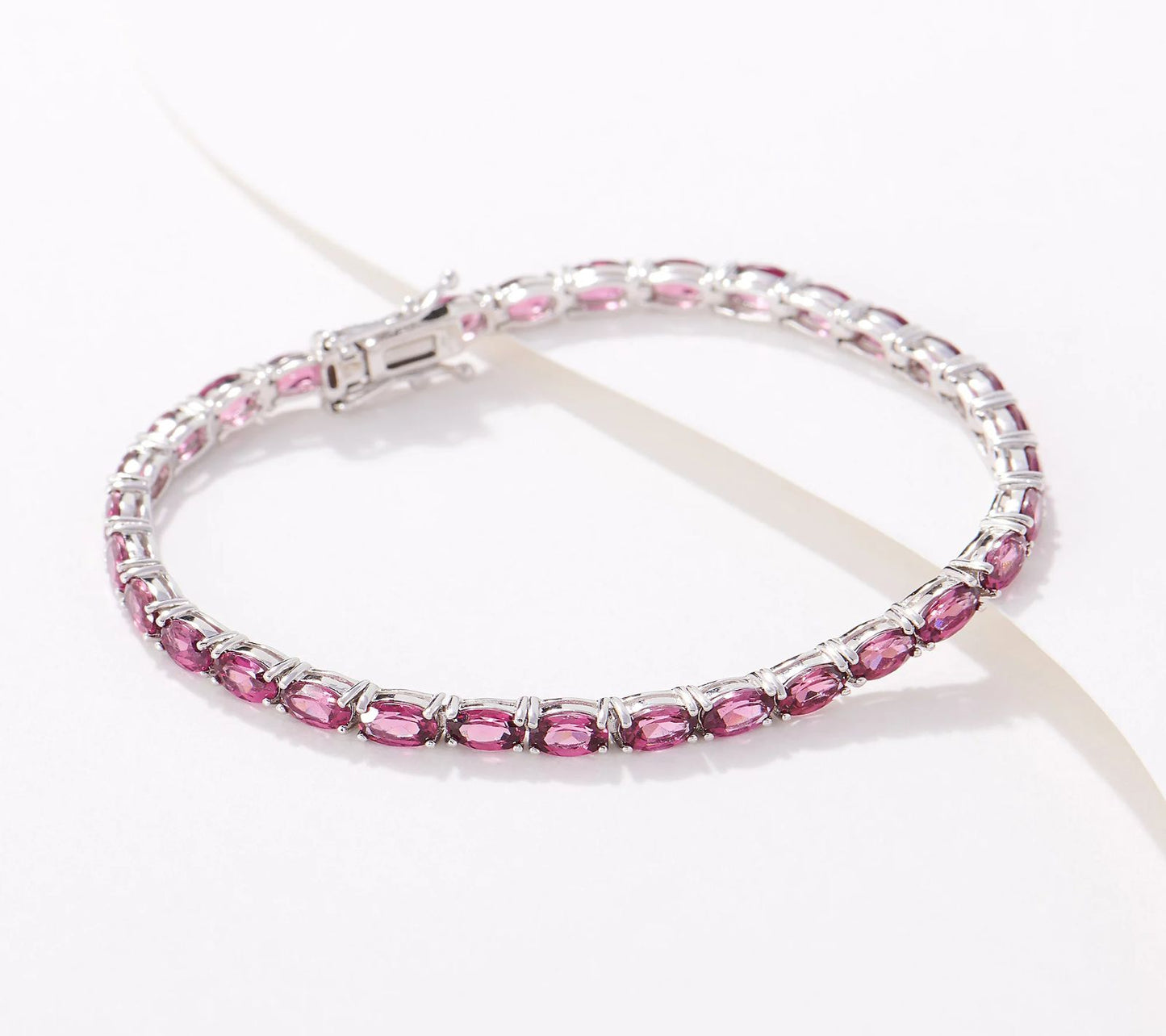 Generation Gems Oval-Cut Pink Rhodolite Tennis Bracelet Sterling. Size 7-3/4"L