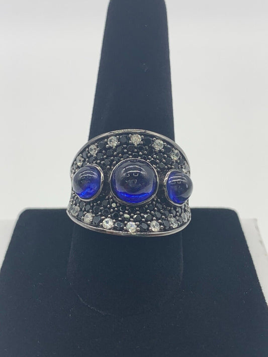 Rarities Rhodium Sterling Silver Sapphire, Spinel and White Zircon Ring. Size 9