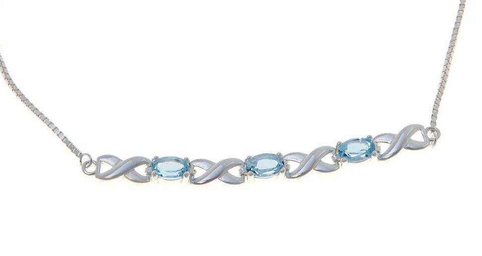 Sevilla Silver Sterling "X and O" Blue Topaz Adjustable Bracelet