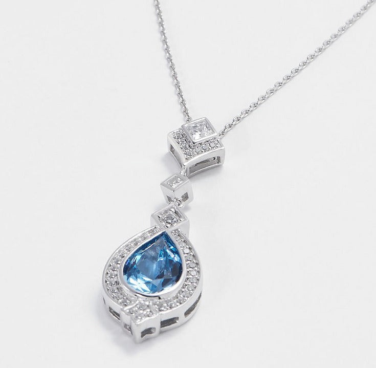 DMQ Simulated Light Blue Topaz & CZ Pendant, Size 16"+1.75" Sterling Silver