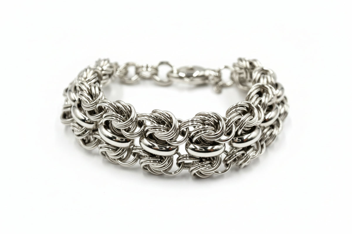 Bronzo Italia Silvertone Polished Woven Love Knot Bracelet 7-1/4"