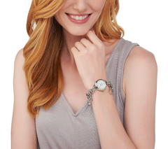 C. Wonder Mother of Pearl Charm Silver Tone Bracelet Watch