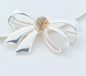 Joan Rivers Silvertone Polished Bow Pin with Pave Stones