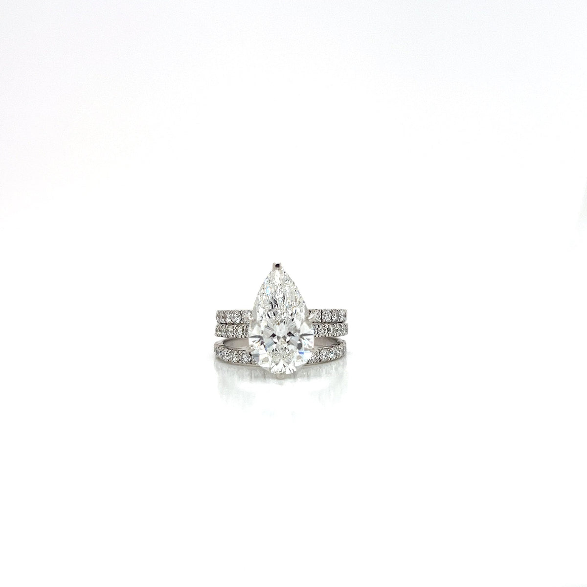14KW Lab-Grown Diamond Pear Ring â€“ 5.50CTTW, F/VS1, IGI Certified (Set of 3)