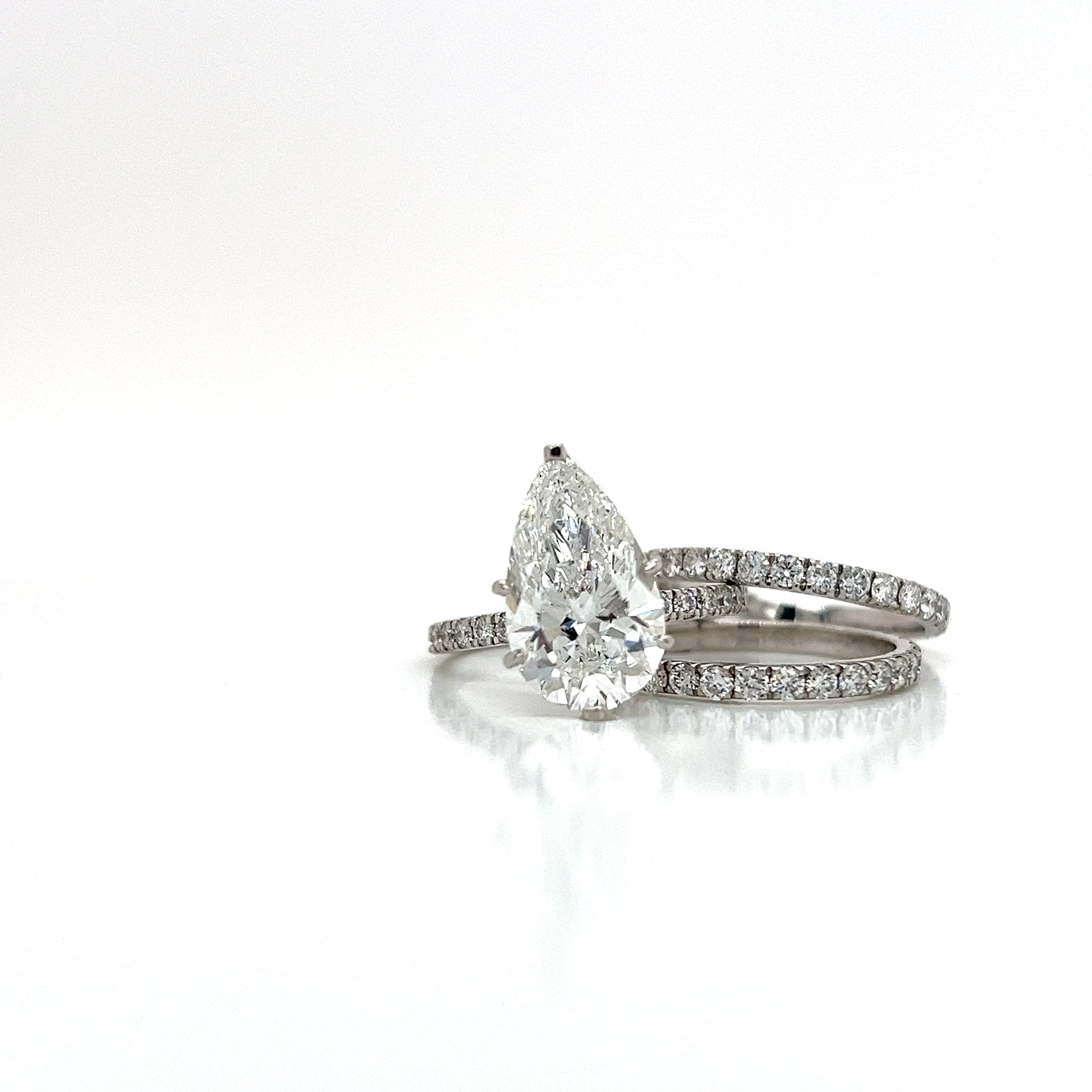 14KW Lab-Grown Diamond Pear Ring â€“ 5.50CTTW, F/VS1, IGI Certified (Set of 3)