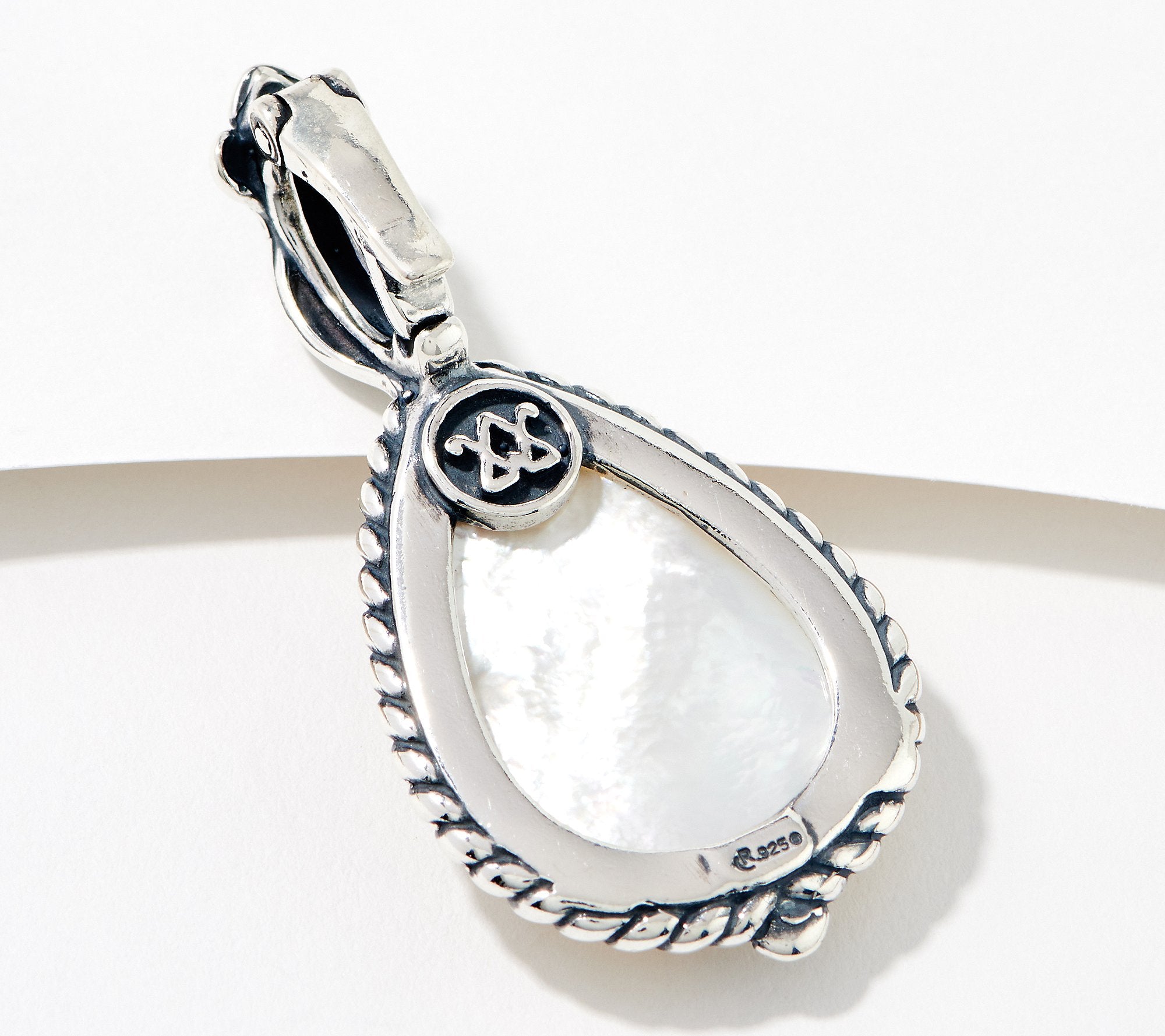 American West Sterling Silver Mother of Pearl Carved Enhancer