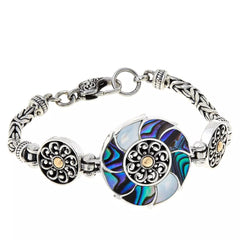 Pulsera Bali RoManse de plata de ley con nácar y flor de abulón. 16,7 cm